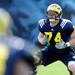 Michigan offensive lineman Dan Samuelson stretches on the practice field outside of the Al Glick Field House on Thursday, August 8, 2013. Melanie Maxwell | AnnArbor.com 